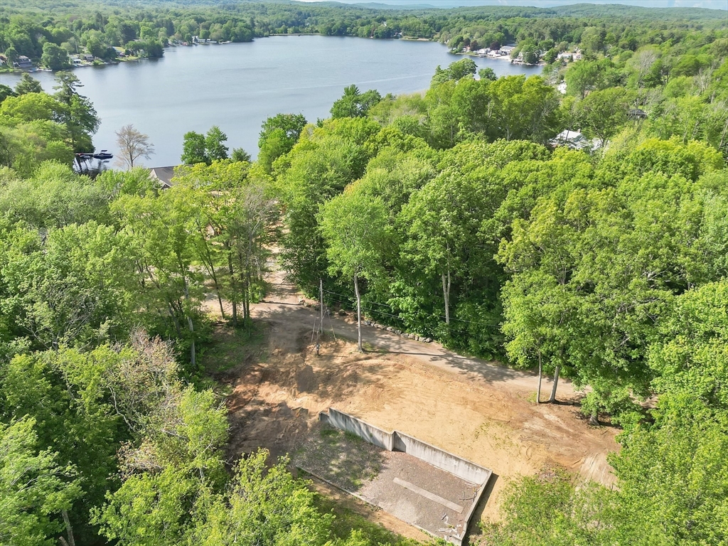 50 Fountain Road Wales, MA 01081 - Photo 6 of 20 a view of a lake with beach and outdoor space