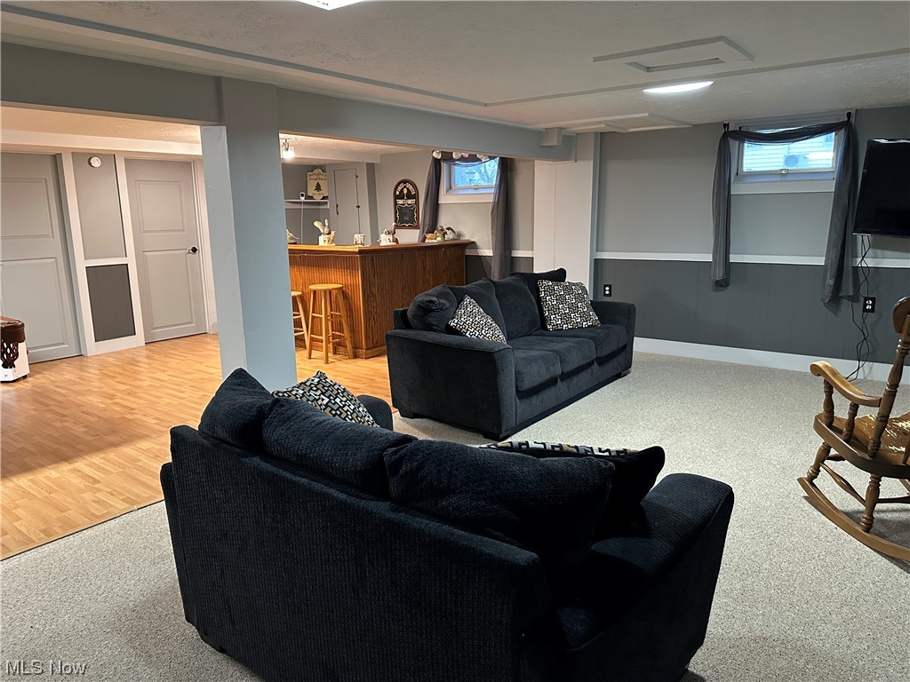 13055 Unity Road New Springfield, OH 44443 - Photo 39 of 49 Living room featuring light colored carpet