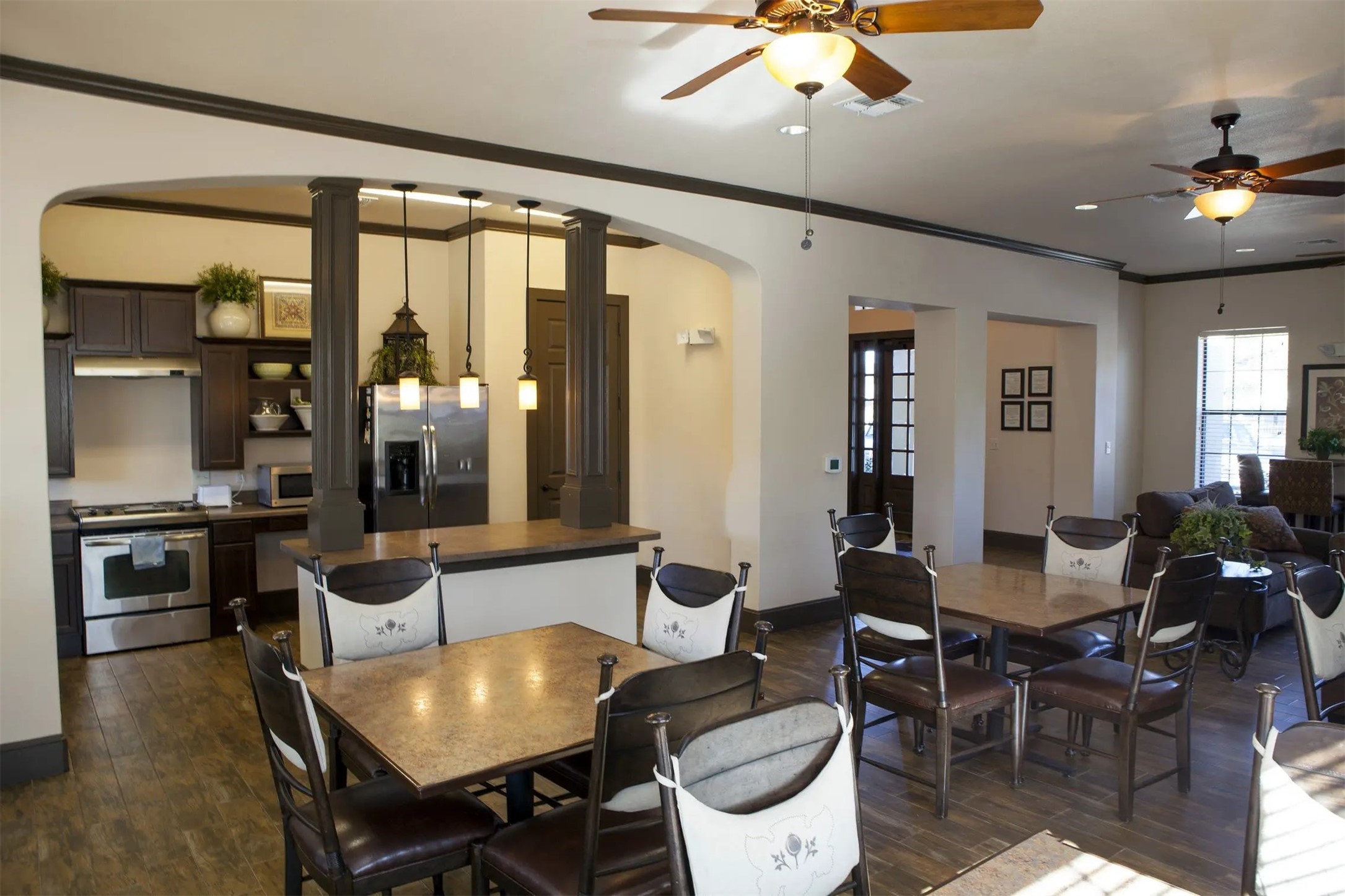 800 Babcock Road, Unit 50 San Antonio, TX 78201 - Photo 9 of 12 a living room with furniture a chandelier and a dining table