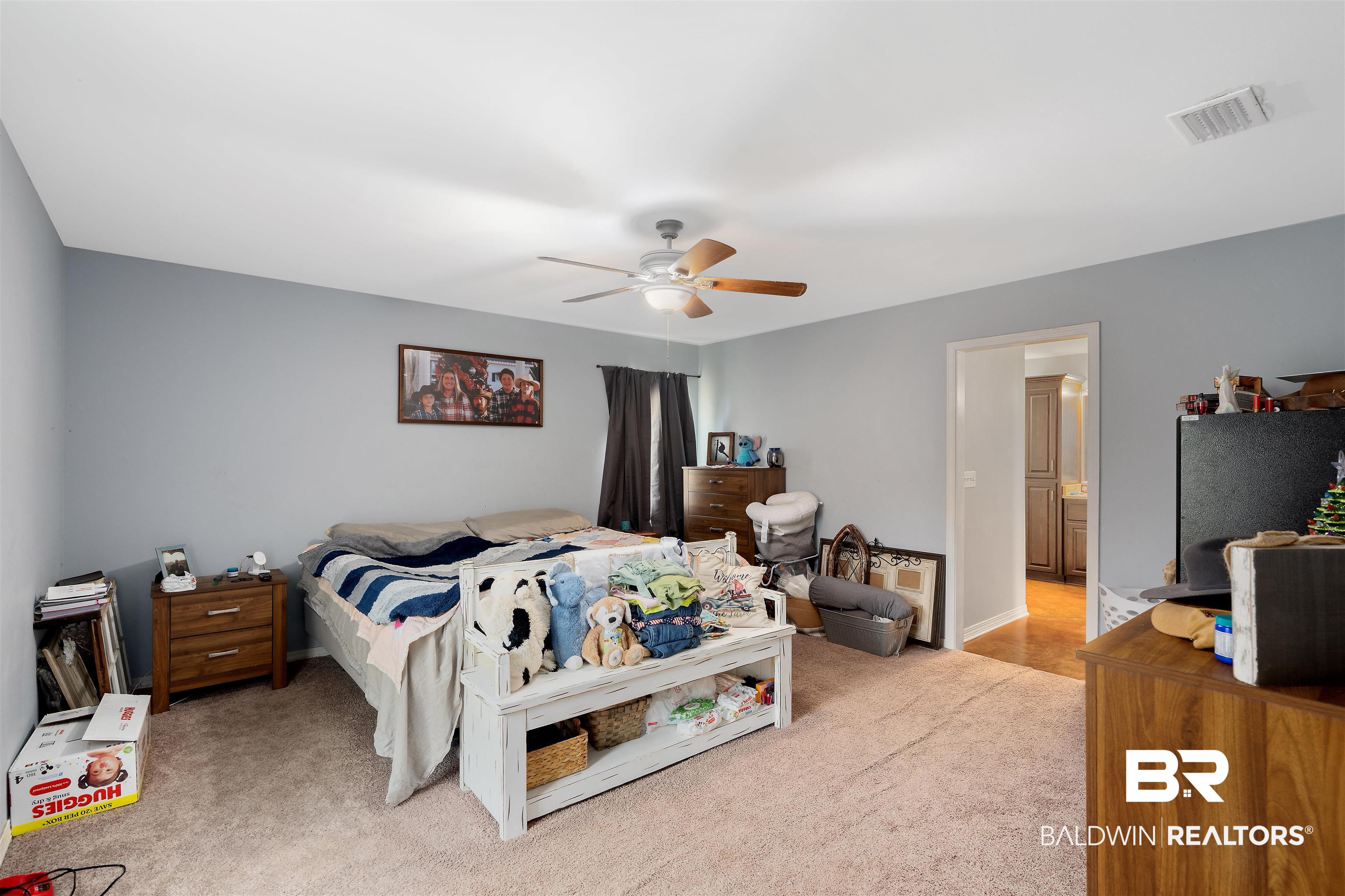 20076 Patty Jr Lane Bay Minette, AL 36507 - Photo 16 of 31 Carpeted bedroom featuring fridge and ceiling fan