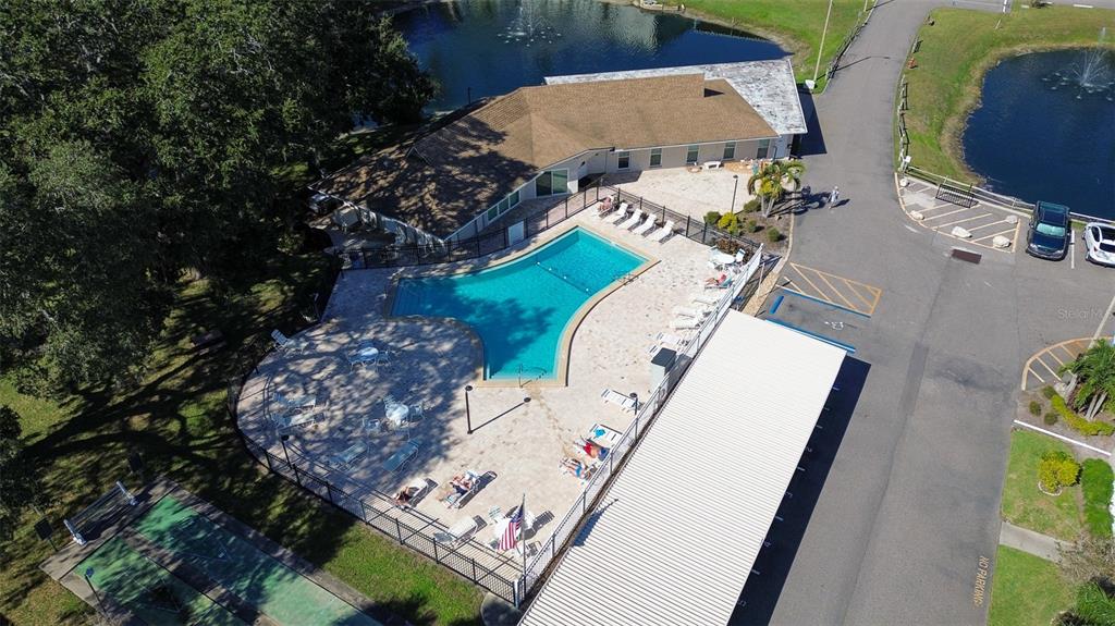 936 Virginia Street, Unit 206 Dunedin, FL 34698 - Photo 20 of 22 an aerial view of a house having outdoor space