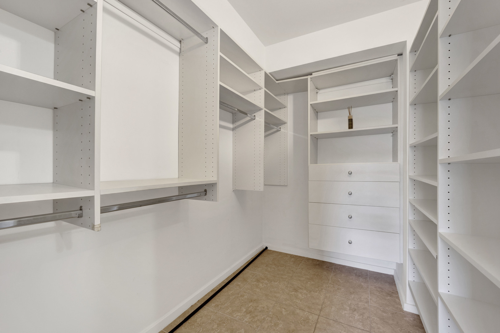 40 East 9th Street, Unit 609 Chicago, IL 60605 - Photo 21 of 37 a view of walk in closet with empty racks