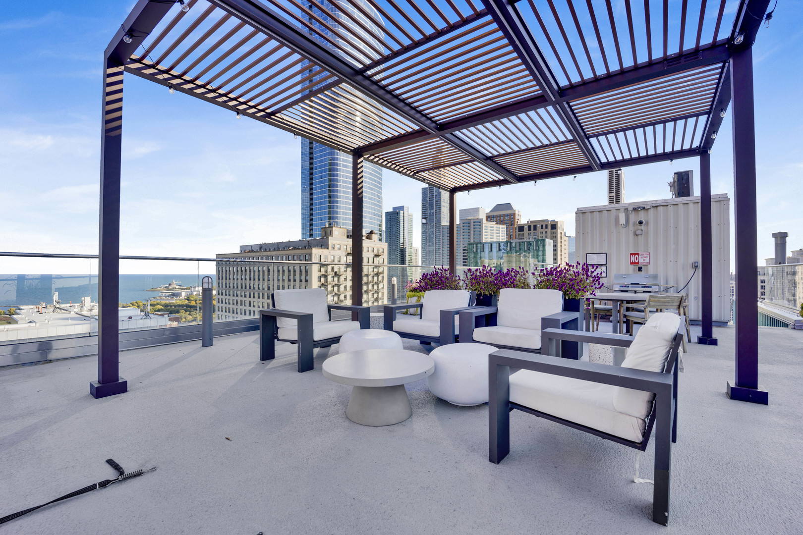 40 East 9th Street, Unit 609 Chicago, IL 60605 - Photo 30 of 37 a living room with furniture and a table