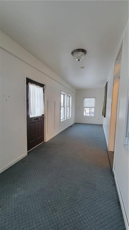 342 East Main Street Somerset, PA 15501 - Photo 19 of 43 a view of an empty room and window and fire place