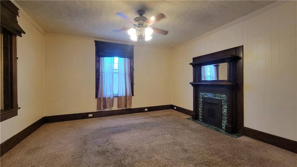 342 East Main Street Somerset, PA 15501 - Photo 8 of 43 a view of an empty room with a fireplace