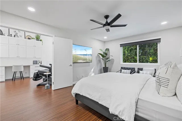 a bedroom with a bed furniture and a window
