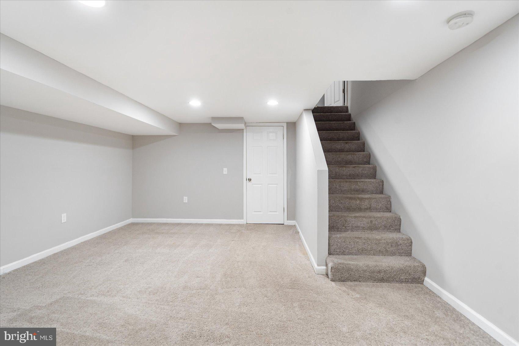 706 Norris Lane Baltimore, MD 21221 - Photo 21 of 36 a view of an empty room with stairs