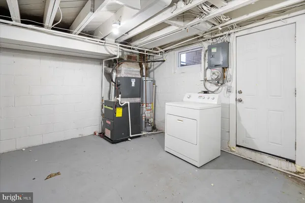 a bathroom with a sink toilet and bathtub