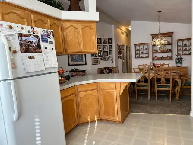 a work room with furniture and wooden floor