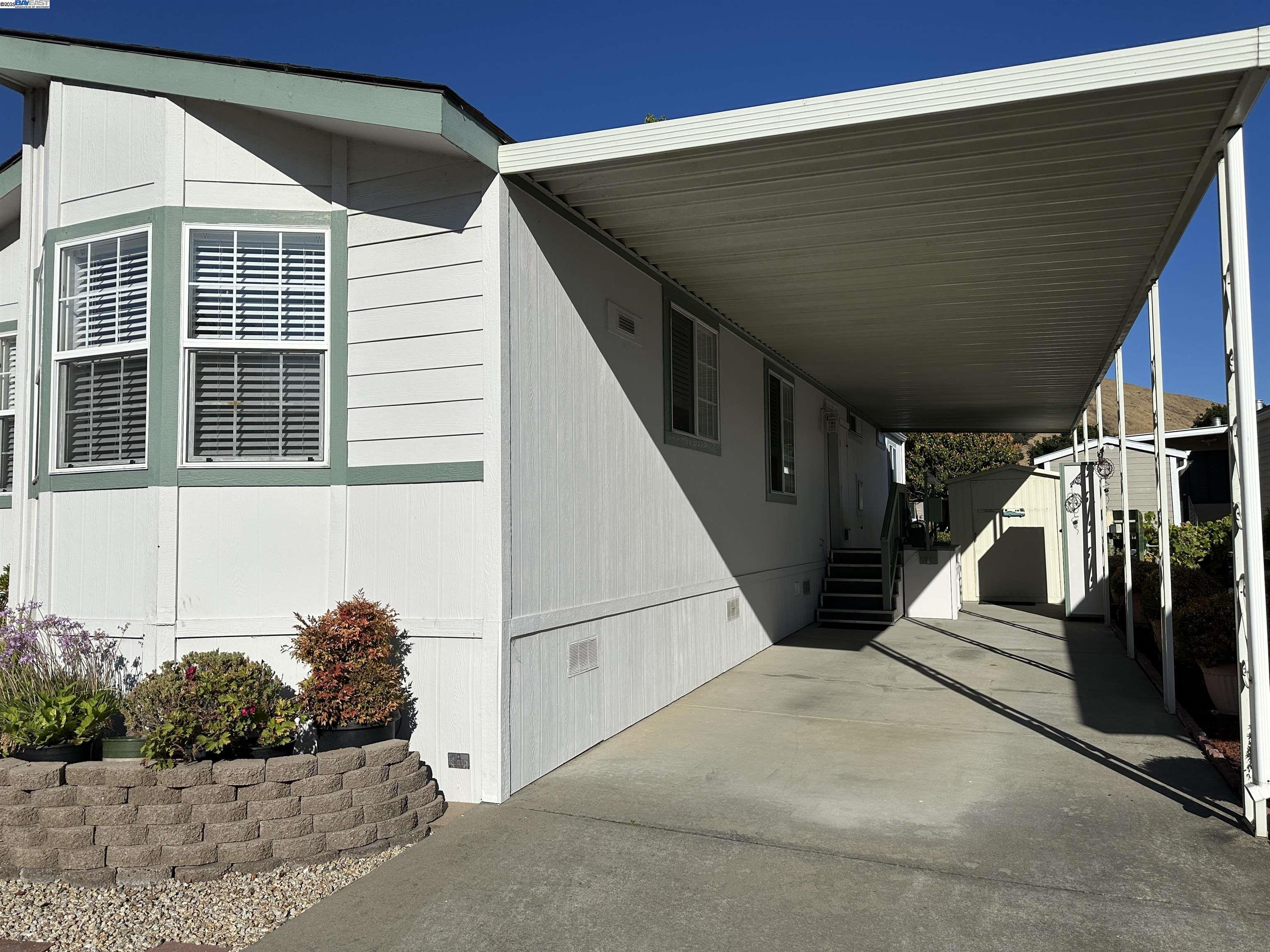 711 Old Canyon Road, Unit 103 Fremont, CA 94536 - Photo 32 of 38 a view of a house with street