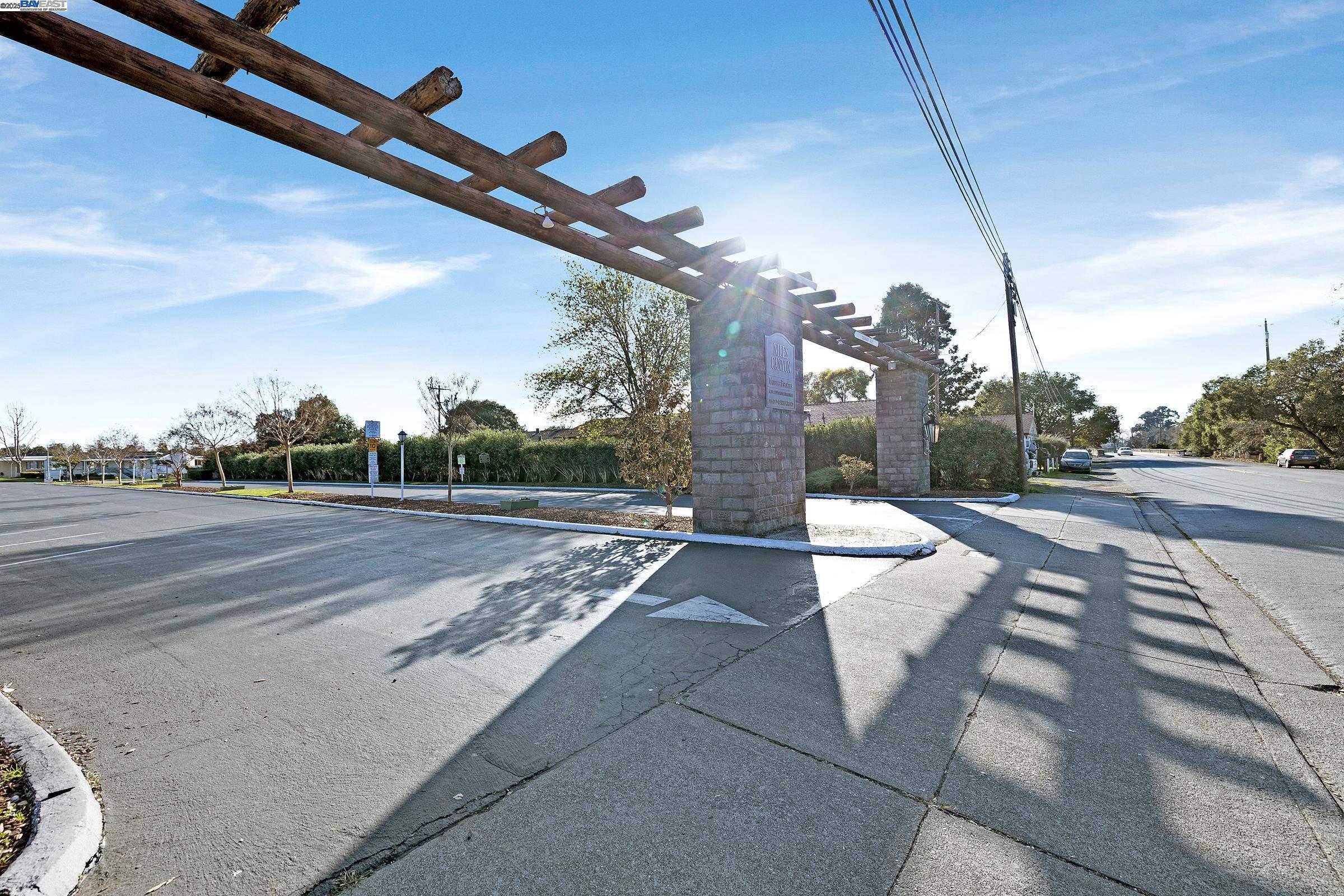 711 Old Canyon Road, Unit 103 Fremont, CA 94536 - Photo 34 of 38 a view of a street with a building in the background