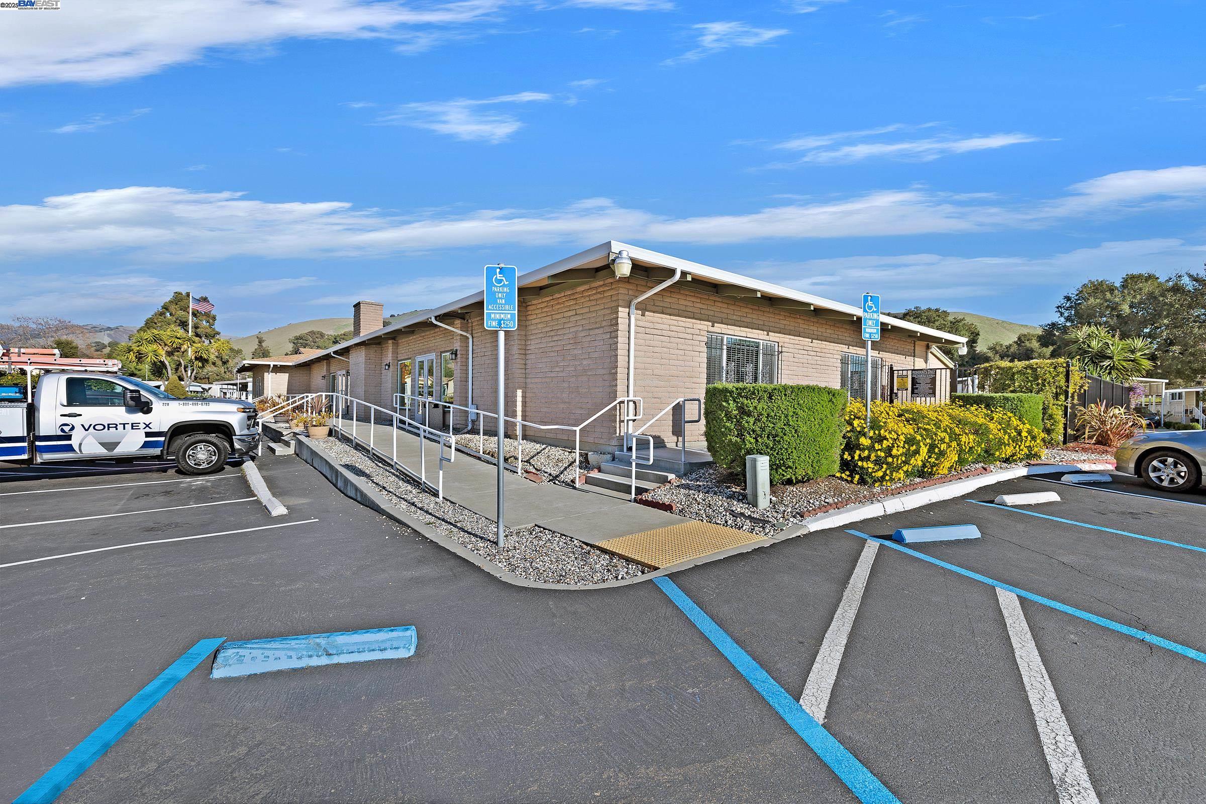 711 Old Canyon Road, Unit 103 Fremont, CA 94536 - Photo 38 of 38 a view of a car park in front of a house