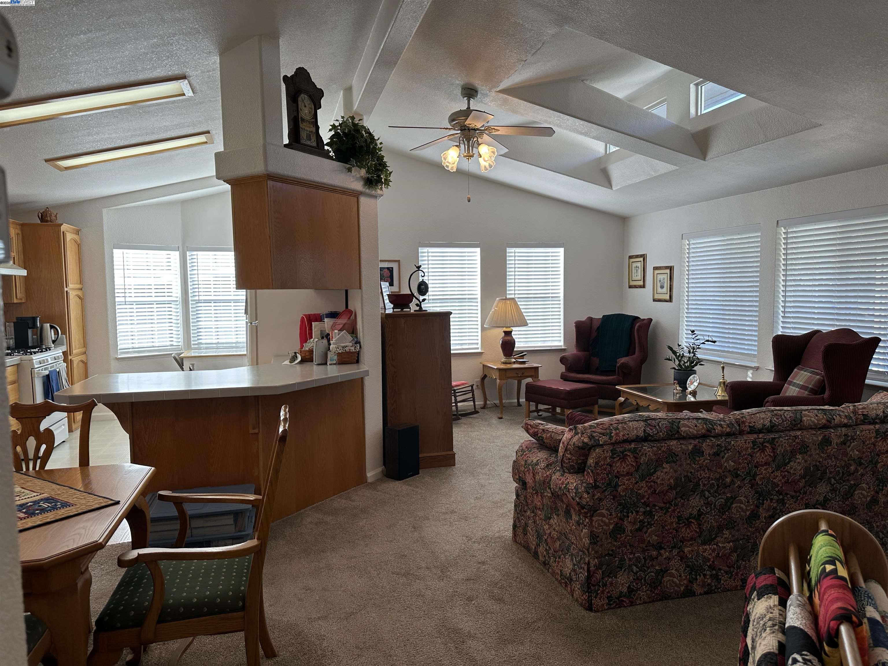 711 Old Canyon Road, Unit 103 Fremont, CA 94536 - Photo 7 of 38 a bed room with furniture and a window