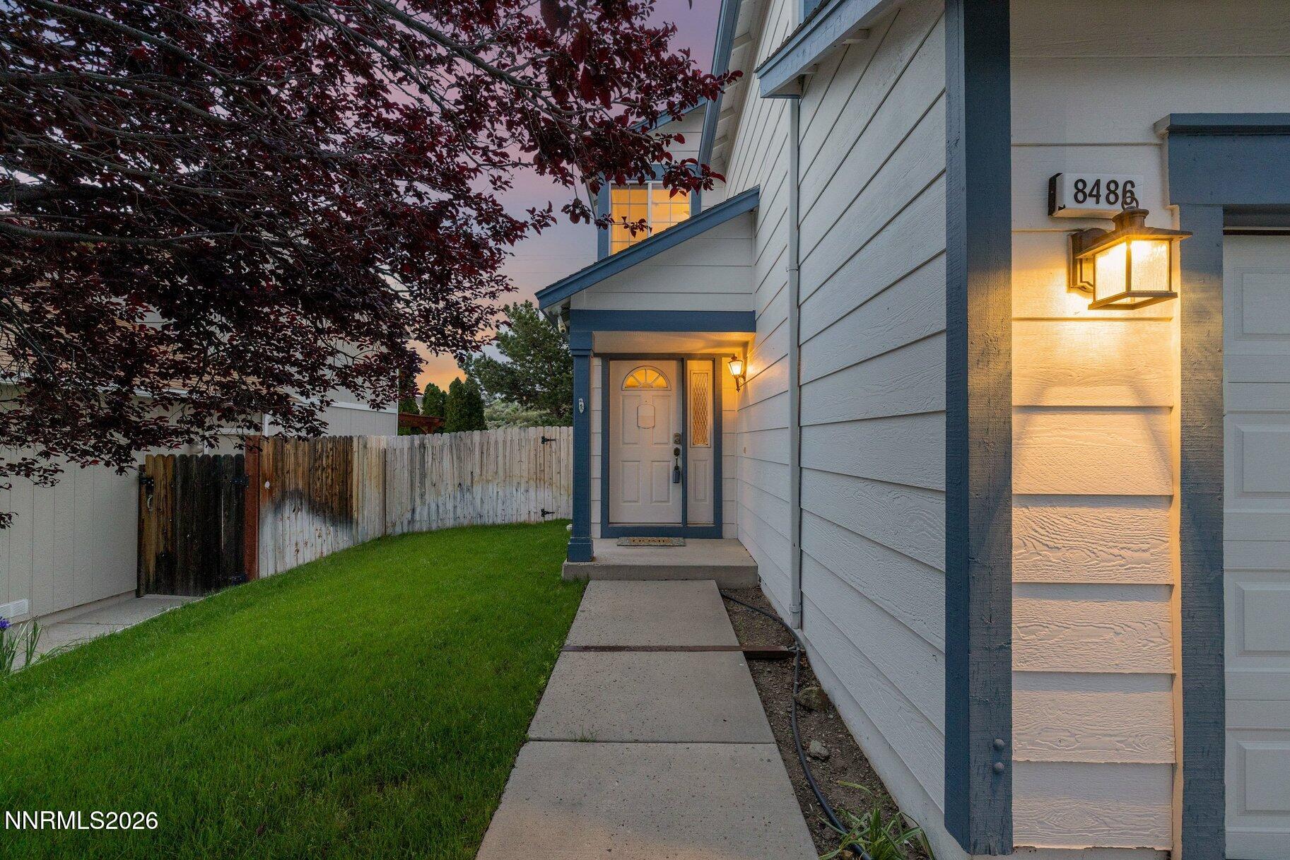 8486 Piper Place Reno, NV 89506 - Photo 62 of 80 a view of a house with a small yard next to a yard