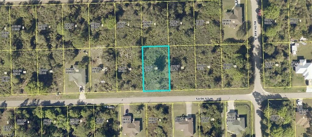 3306 50th Street West Lehigh Acres, FL 33971 - Photo 2 of 6 a view of a small yard
