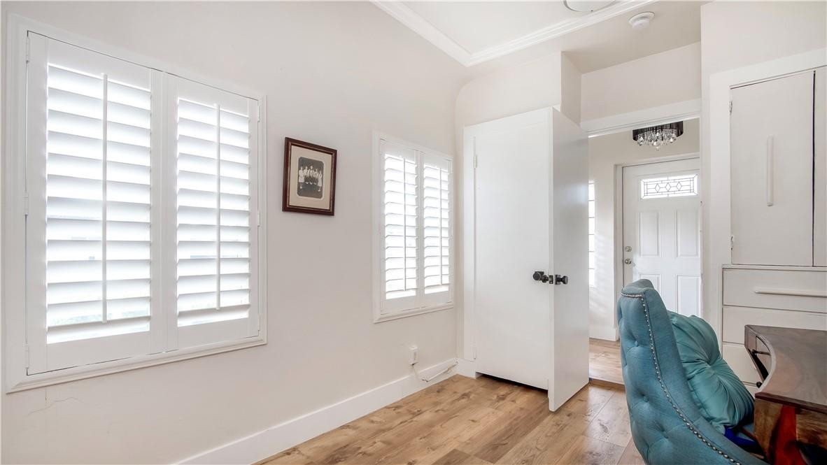 2221 Harding Street Hollywood, FL 33020 - Photo 12 of 30 a view of an empty room with wooden floor and a window
