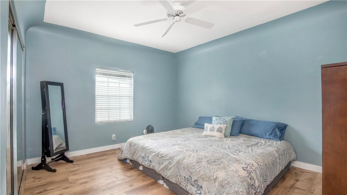 2221 Harding Street Hollywood, FL 33020 - Photo 17 of 30 a bedroom with a bed and a window
