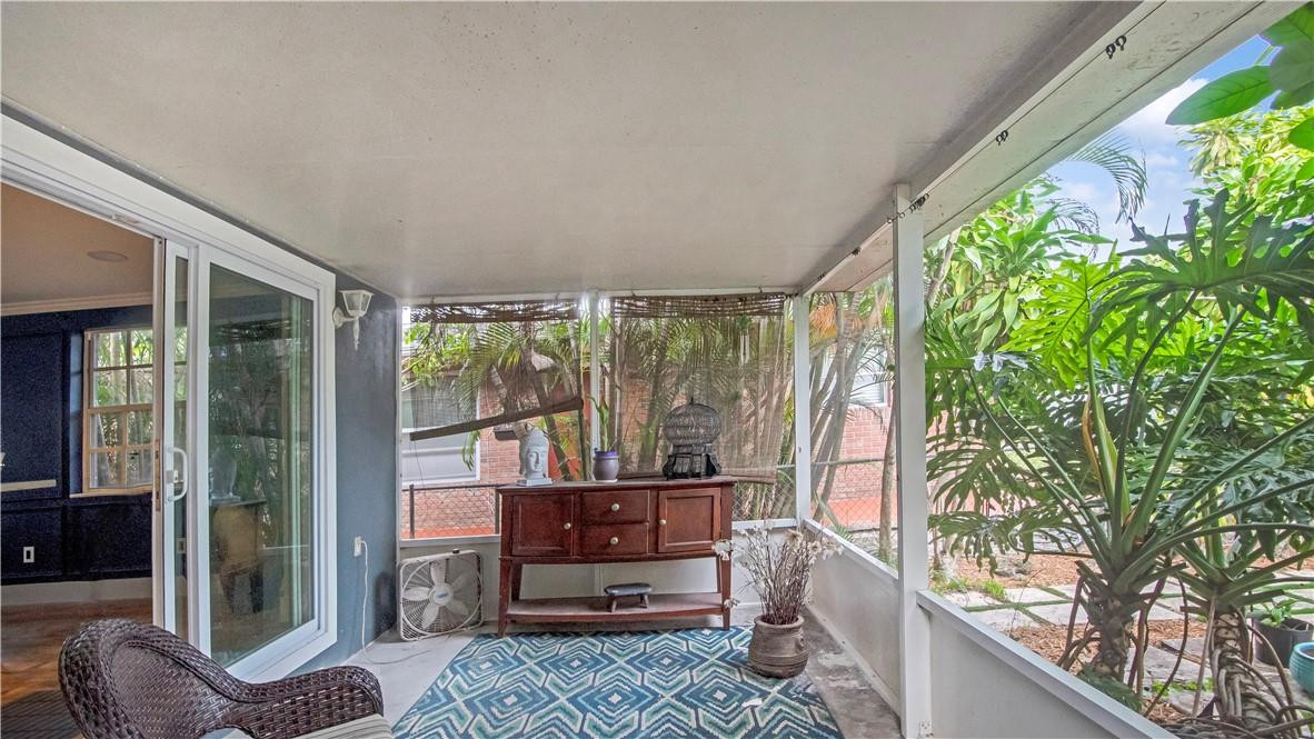 2221 Harding Street Hollywood, FL 33020 - Photo 18 of 30 a outdoor living space with furniture and garden view