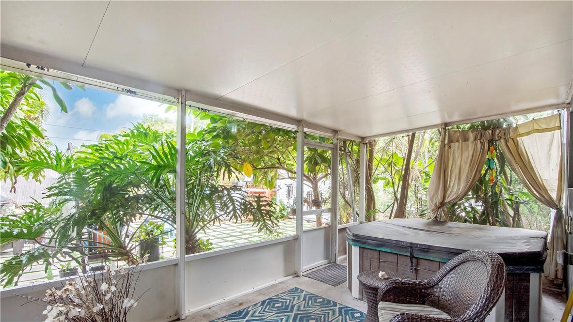 2221 Harding Street Hollywood, FL 33020 - Photo 19 of 30 a room with a large window and furniture