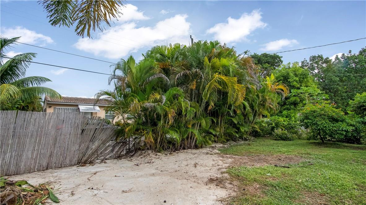 2221 Harding Street Hollywood, FL 33020 - Photo 21 of 30 a view of a yard with plants and trees