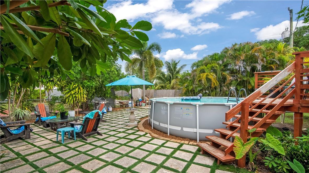 2221 Harding Street Hollywood, FL 33020 - Photo 22 of 30 a view of an outdoor sitting area with chairs