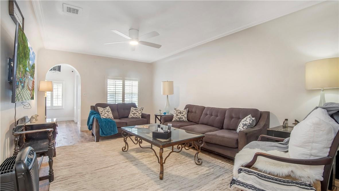 2221 Harding Street Hollywood, FL 33020 - Photo 7 of 30 a living room with furniture a lamp and a window