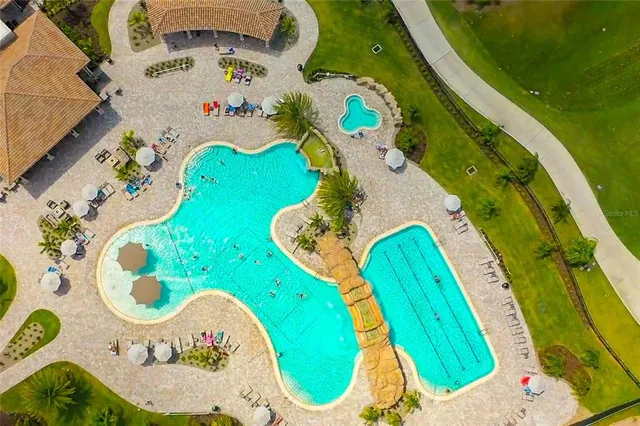 an aerial view of a swimming pool