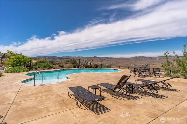 a view of a terrace with sitting area