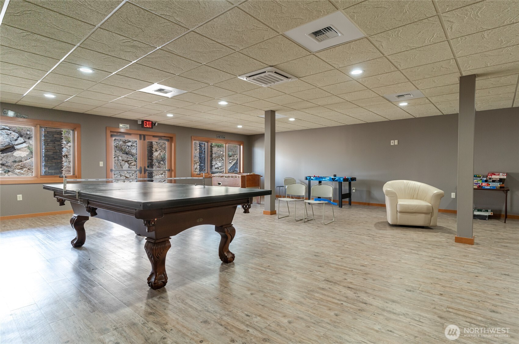 1 Gunsmoke Road Brewster, WA 98812 - Photo 17 of 29 a living room with furniture and a table