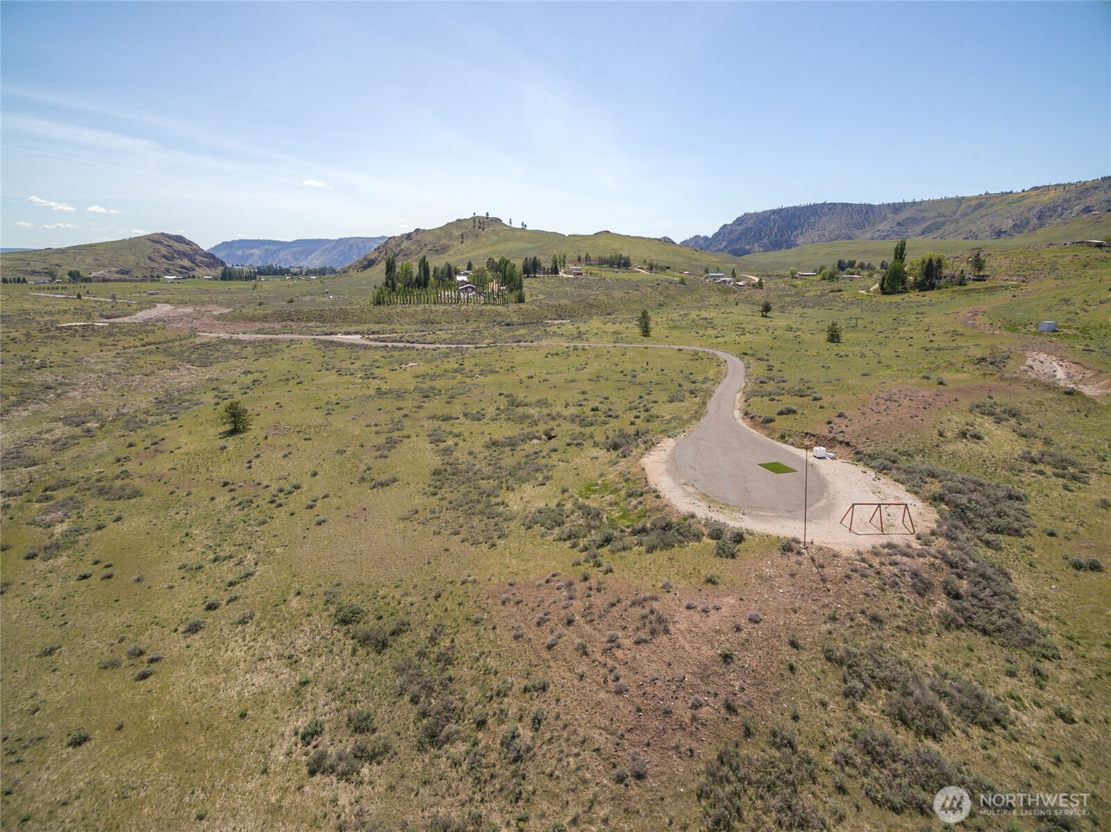 1 Gunsmoke Road Brewster, WA 98812 - Photo 23 of 29 a view of a mountain in the distance