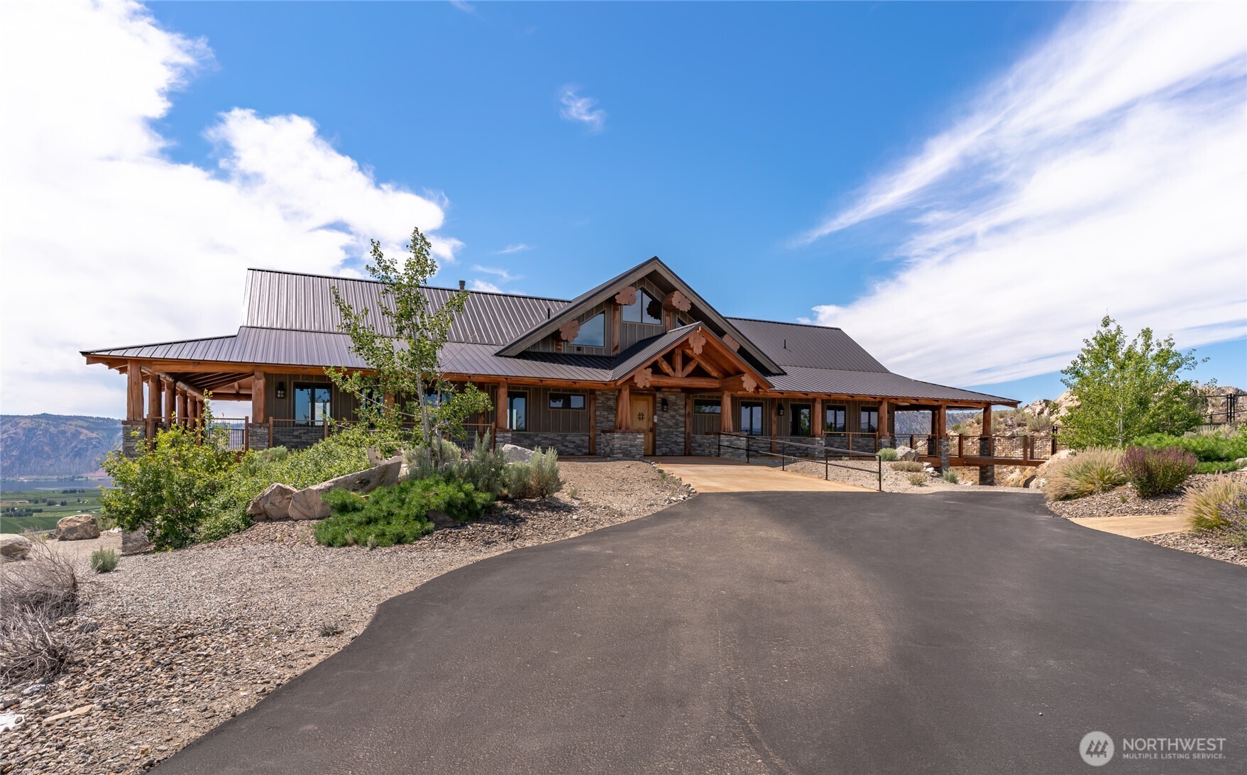 1 Gunsmoke Road Brewster, WA 98812 - Photo 10 of 29 a front view of a house with a yard