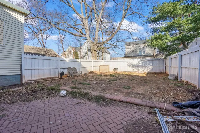 a backyard of a house with seating space