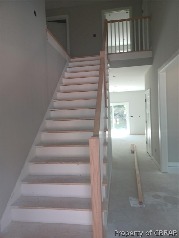 6937 Williams Landing Road Hayes, VA 23072 - Photo 12 of 14 Stairs featuring a towering ceiling