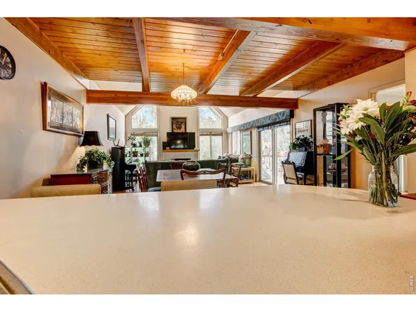 a kitchen with a stove and a window