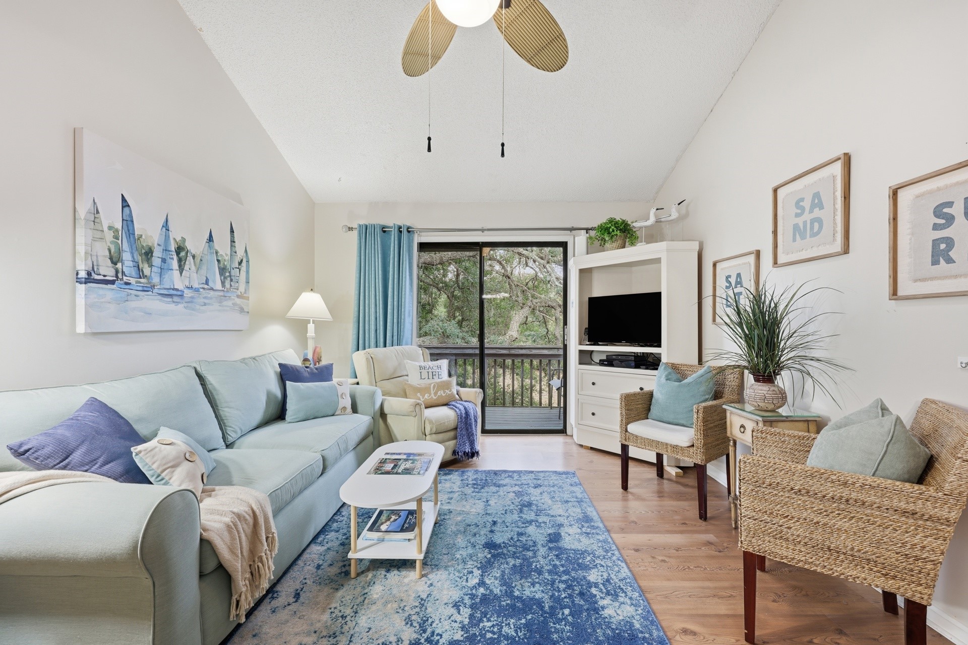 2886 Forest Ridge Drive, Unit U6 Fernandina Beach, FL 32034 - Photo 9 of 43 a living room with furniture and a flat screen tv