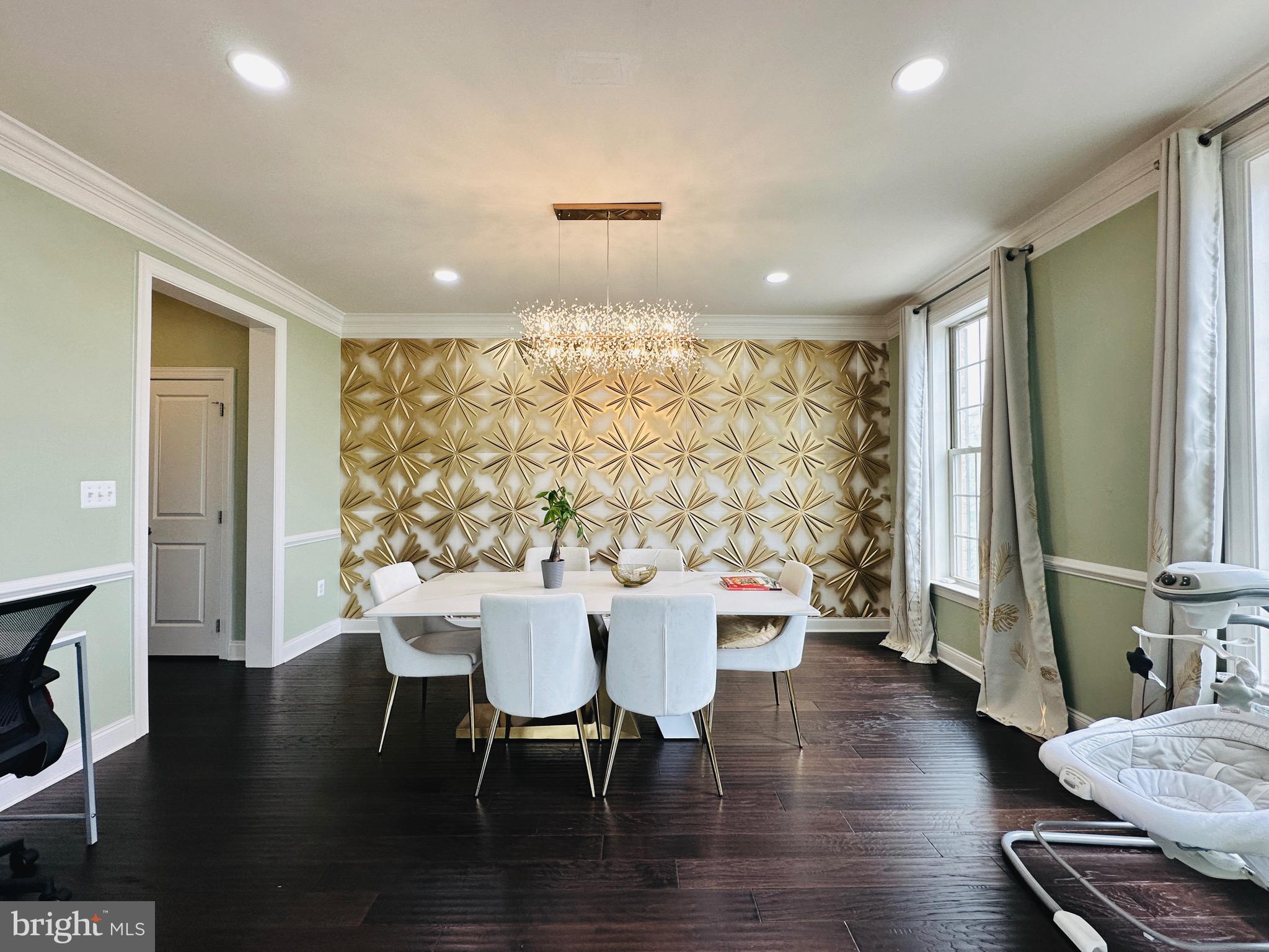 22611 Windsor Locks Square Ashburn, VA 20148 - Photo 14 of 53 a view of a a dining room with furniture window and wooden floor