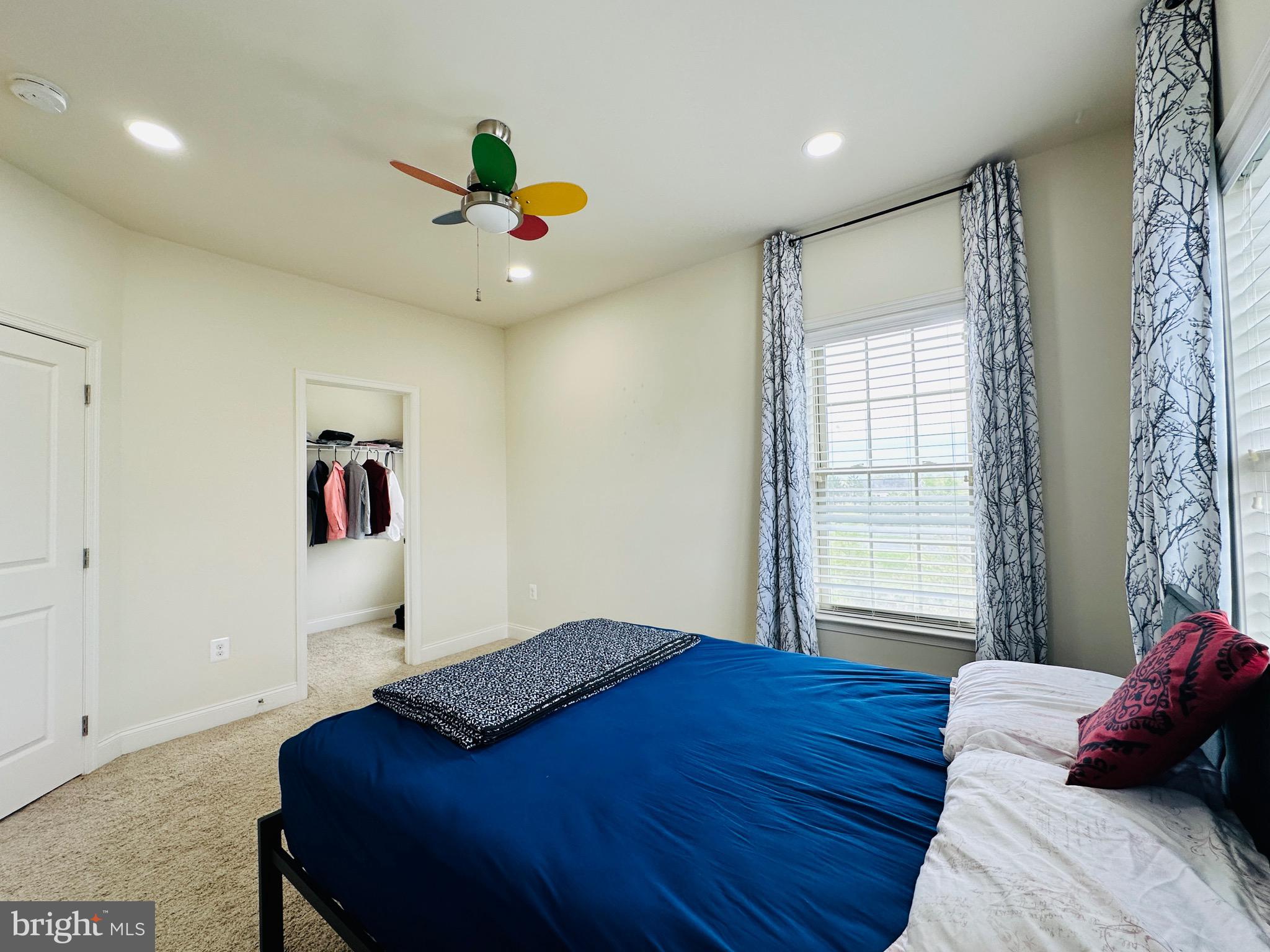 22611 Windsor Locks Square Ashburn, VA 20148 - Photo 26 of 53 a bedroom with a bed and a window