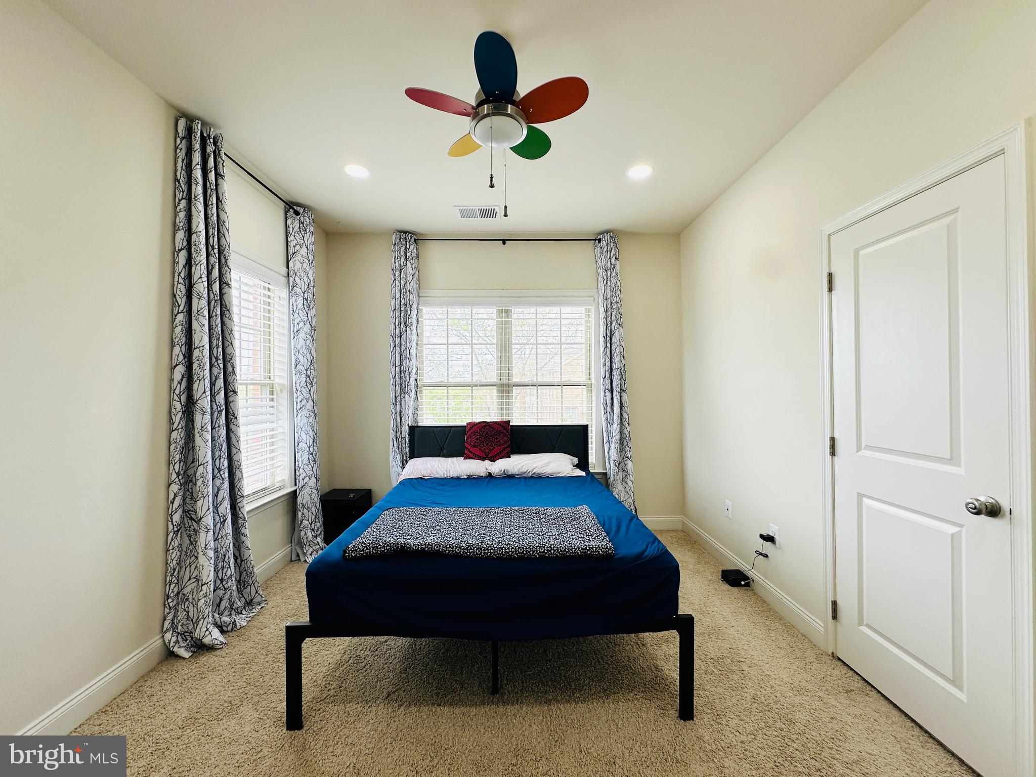 22611 Windsor Locks Square Ashburn, VA 20148 - Photo 27 of 53 a bed room with a bed and a window