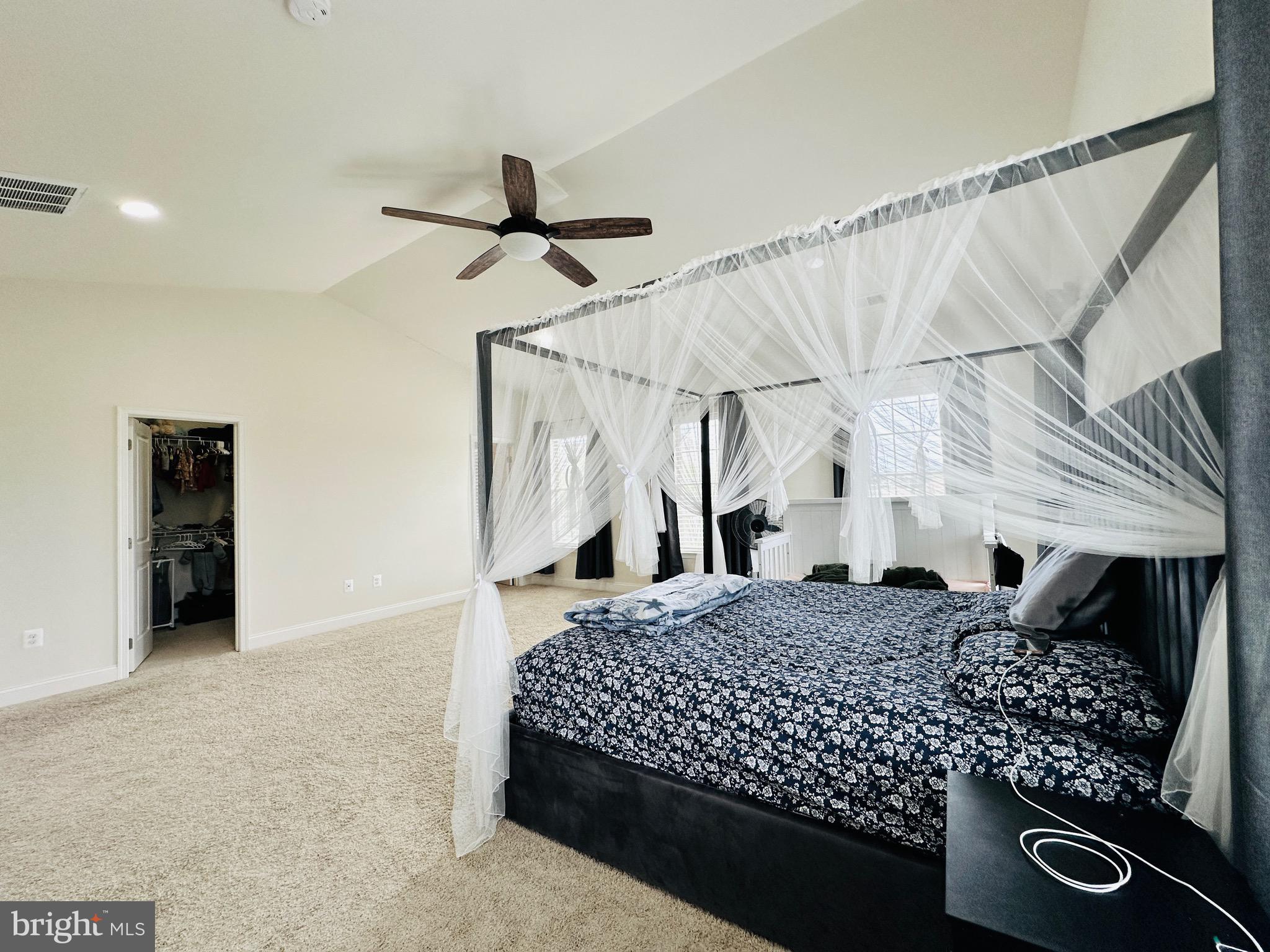 22611 Windsor Locks Square Ashburn, VA 20148 - Photo 30 of 53 a bedroom with a bed dresser and a window