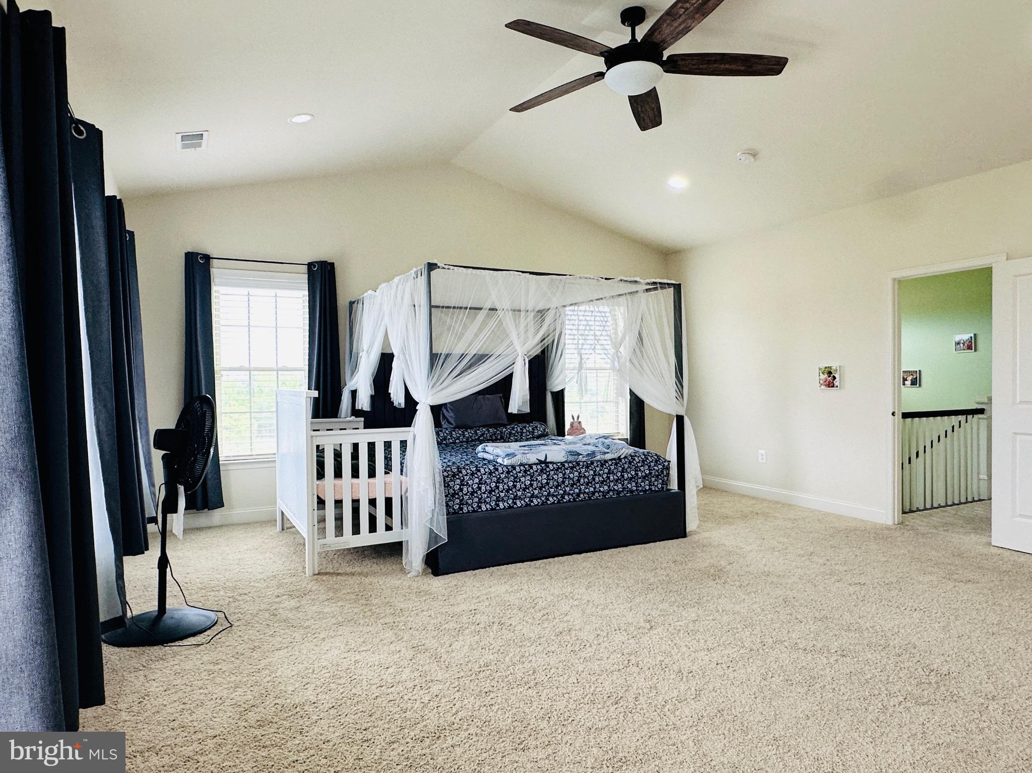 22611 Windsor Locks Square Ashburn, VA 20148 - Photo 34 of 53 a living room with furniture and a ceiling fan