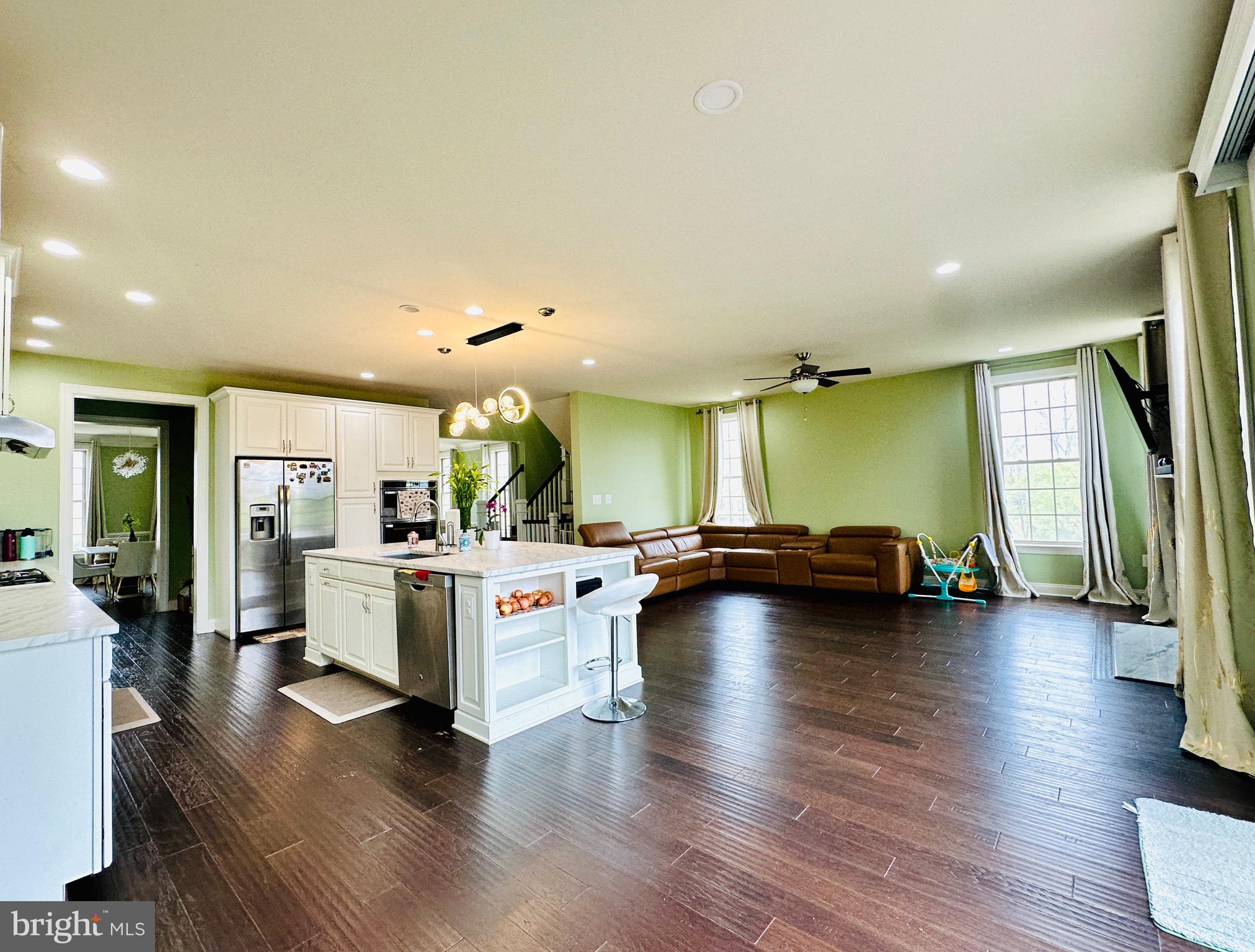 22611 Windsor Locks Square Ashburn, VA 20148 - Photo 4 of 53 a view of a living room and dining room