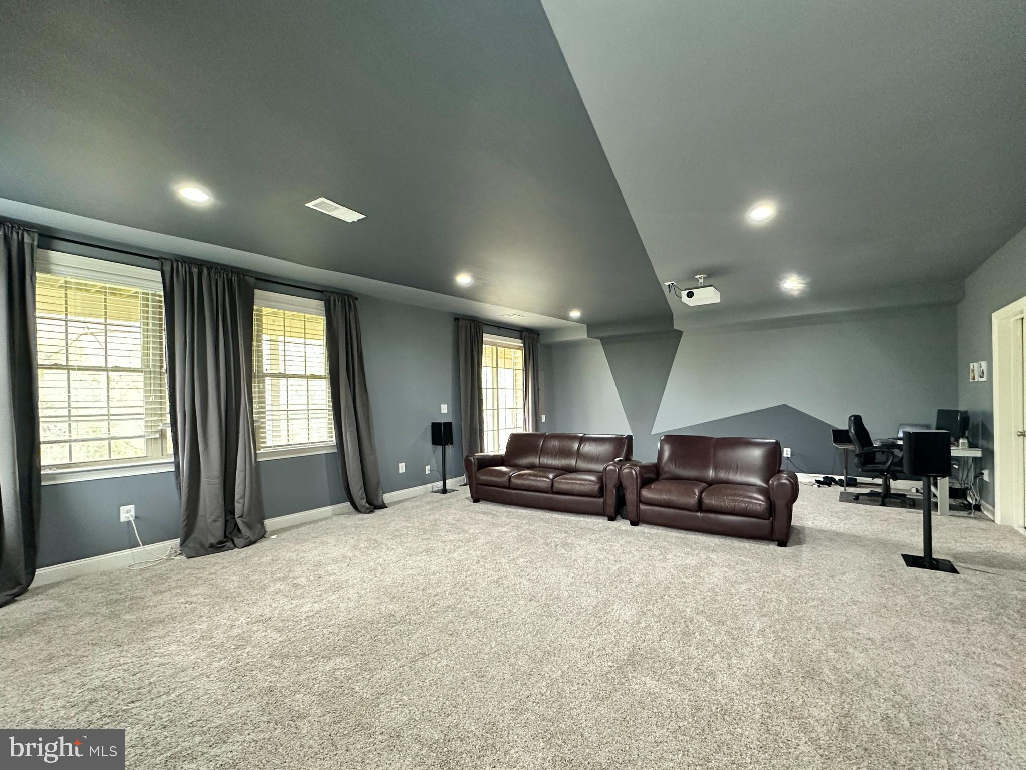 22611 Windsor Locks Square Ashburn, VA 20148 - Photo 42 of 53 a living room with furniture and a flat screen tv