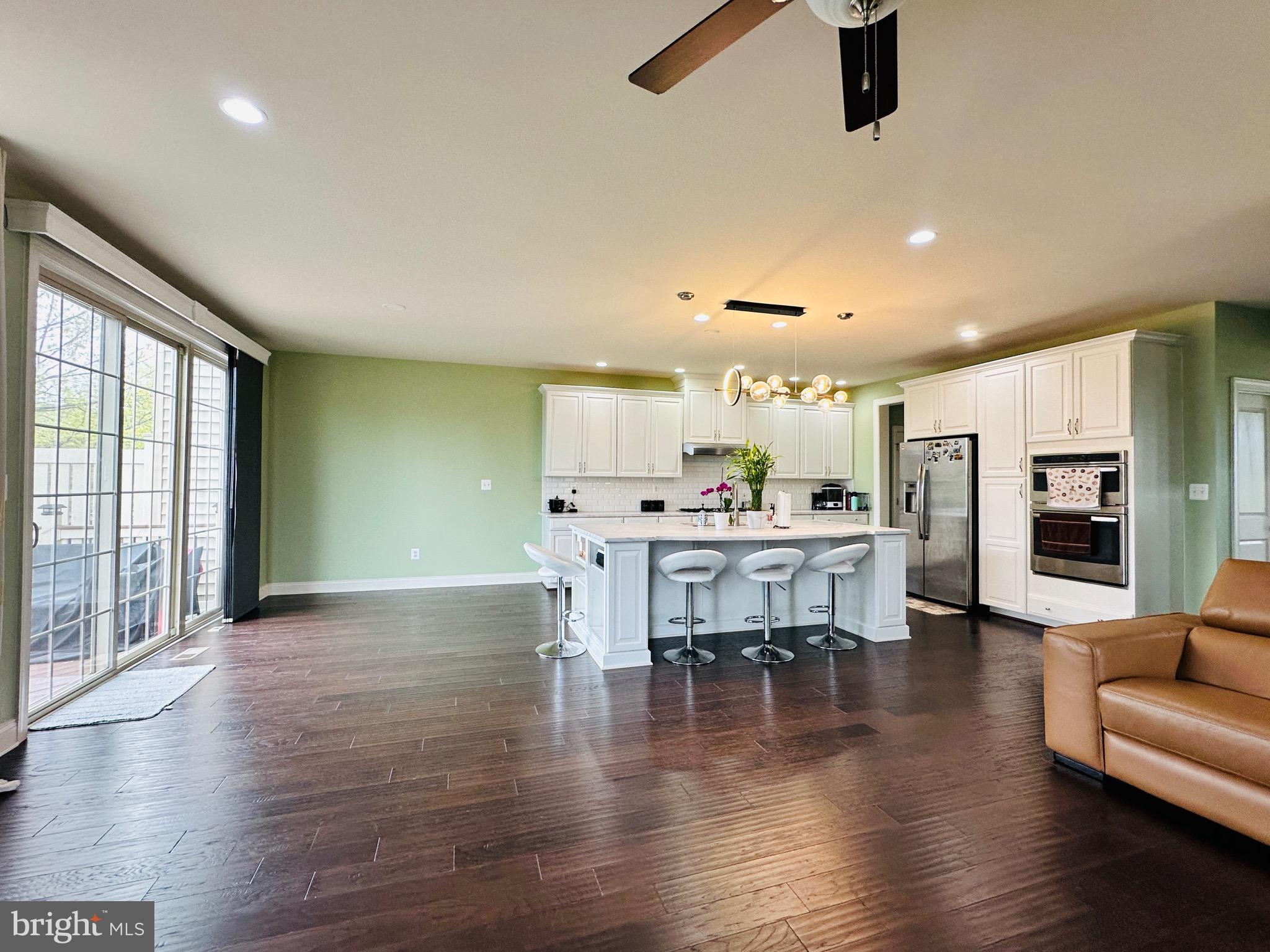 22611 Windsor Locks Square Ashburn, VA 20148 - Photo 5 of 53 a dining room with furniture and wooden floor