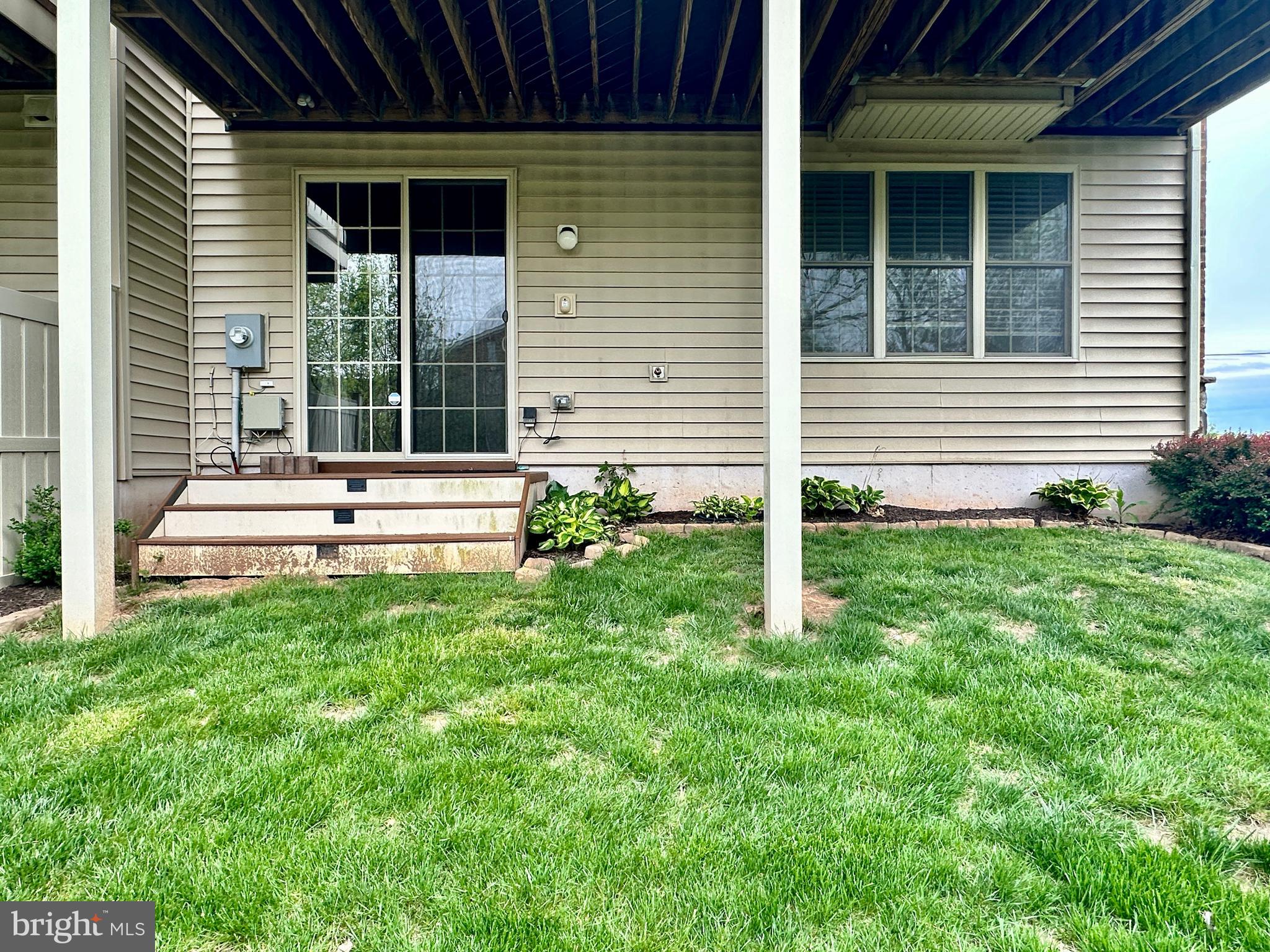22611 Windsor Locks Square Ashburn, VA 20148 - Photo 52 of 53 a house view with a garden