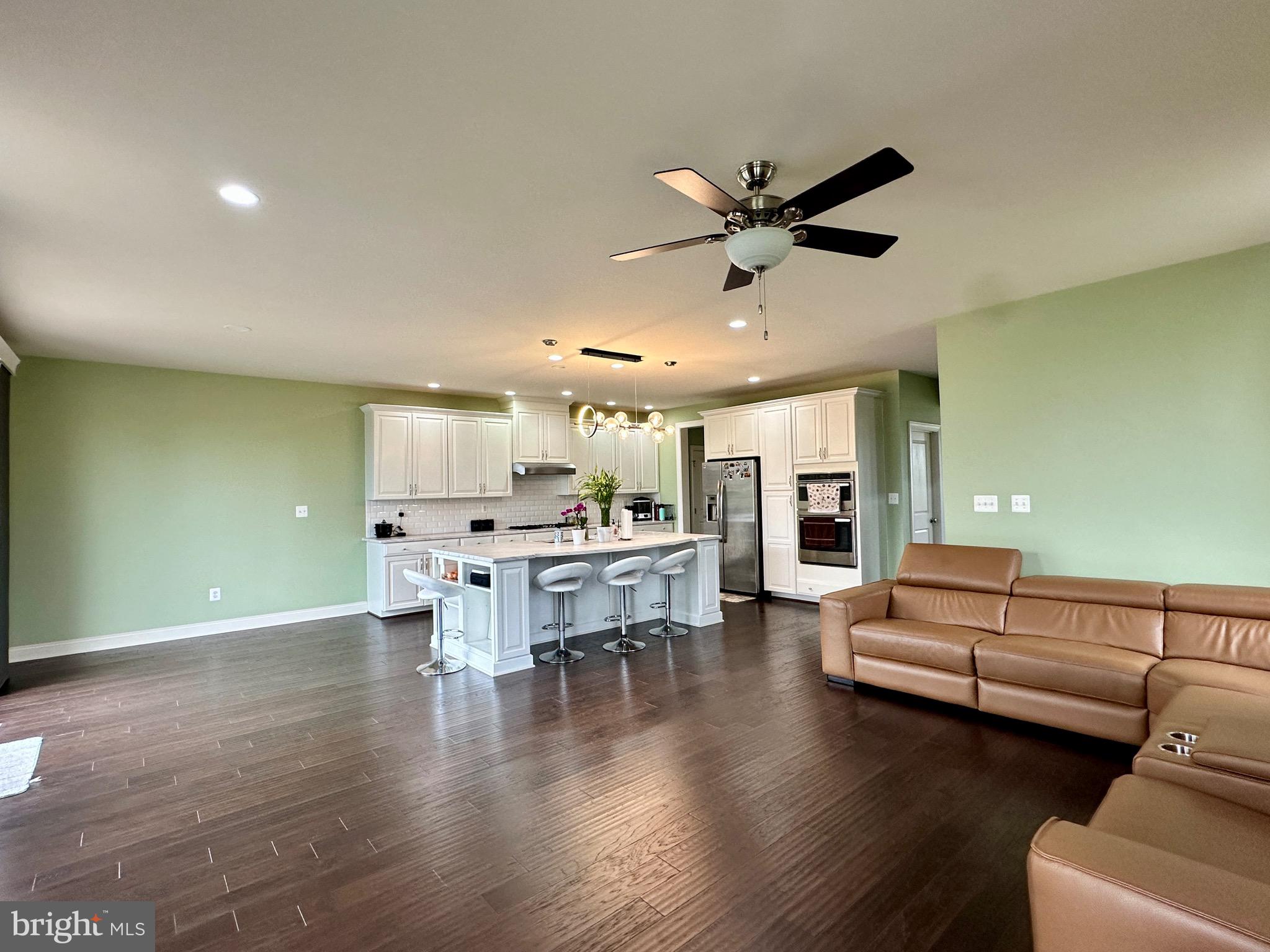 22611 Windsor Locks Square Ashburn, VA 20148 - Photo 6 of 53 a living room with furniture and a large window
