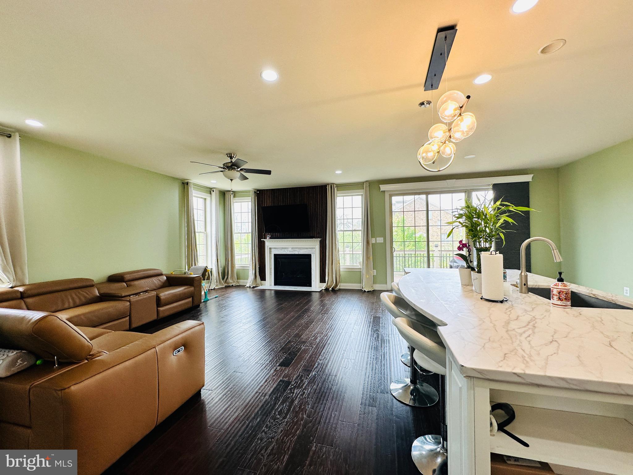 22611 Windsor Locks Square Ashburn, VA 20148 - Photo 7 of 53 a living room with furniture and wooden floor