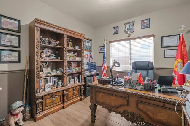 a room with furniture workspace and a window