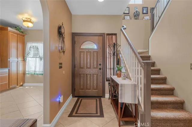 a view of an entryway with a front door