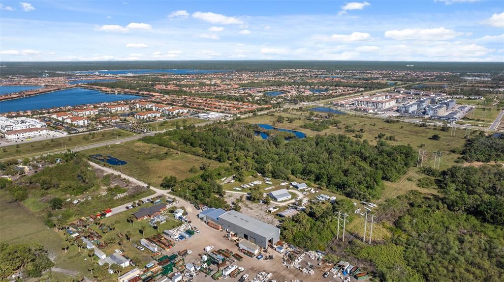 3530 Laurel Road East, Unit A North Venice, FL 34275 - Photo 11 of 17 an aerial view of a residential houses with city view