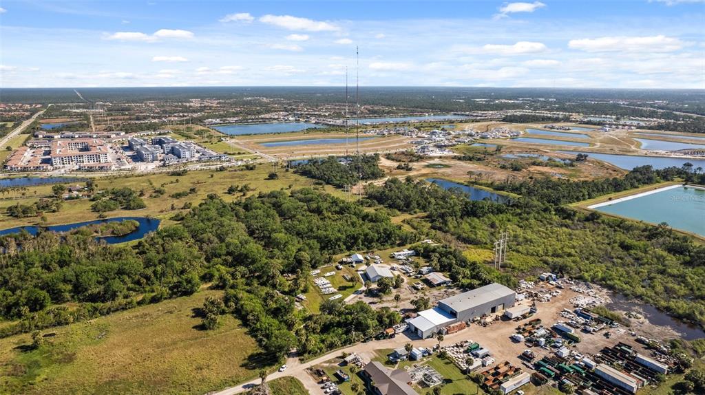 3530 Laurel Road East, Unit A North Venice, FL 34275 - Photo 13 of 17 an aerial view of residential building with parking space
